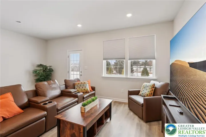 9 ft ceilings, lots of recessed lighting.