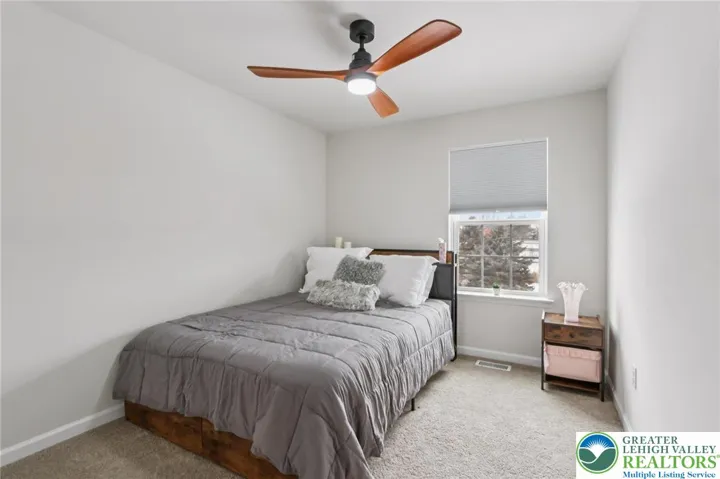 2 additional bedrooms, carpeting and ceiling fan.