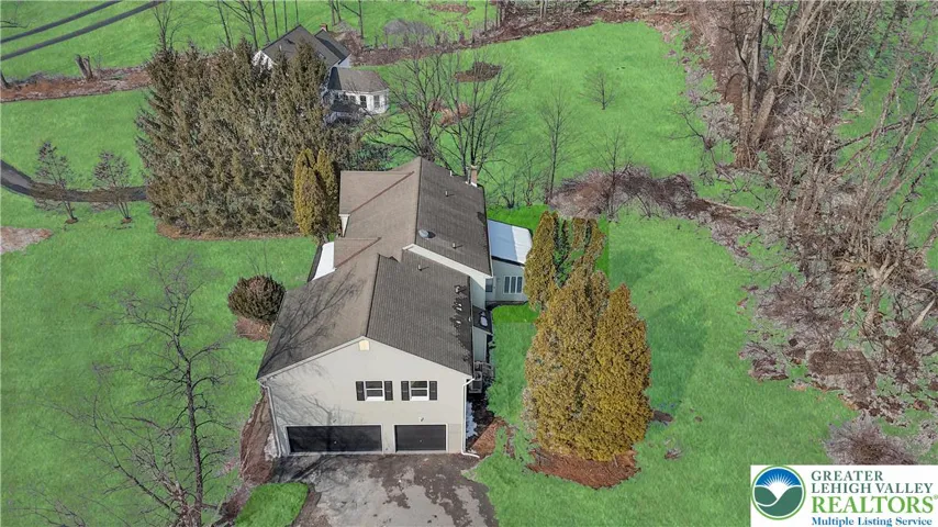 Three car side entry garage