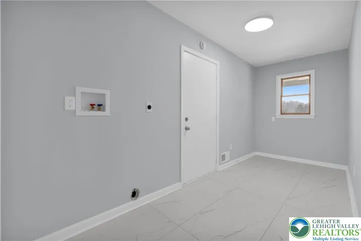 Laundry room off garage