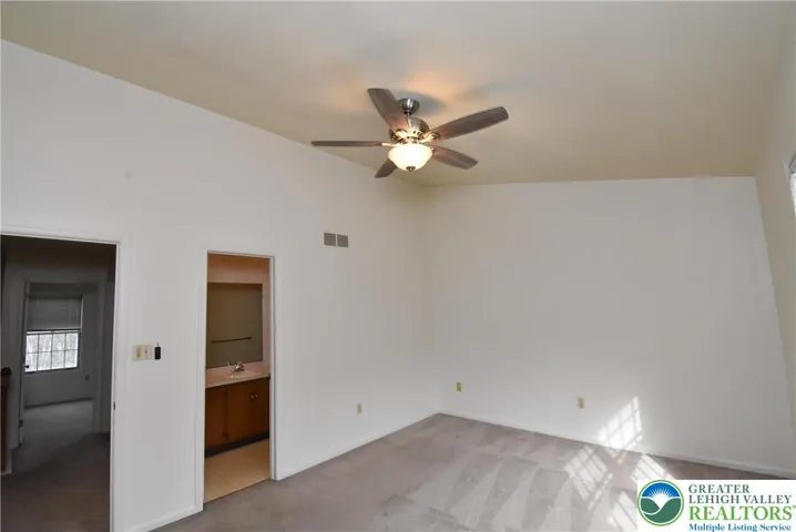 Primary Bedroom with Vaulted Ceiling