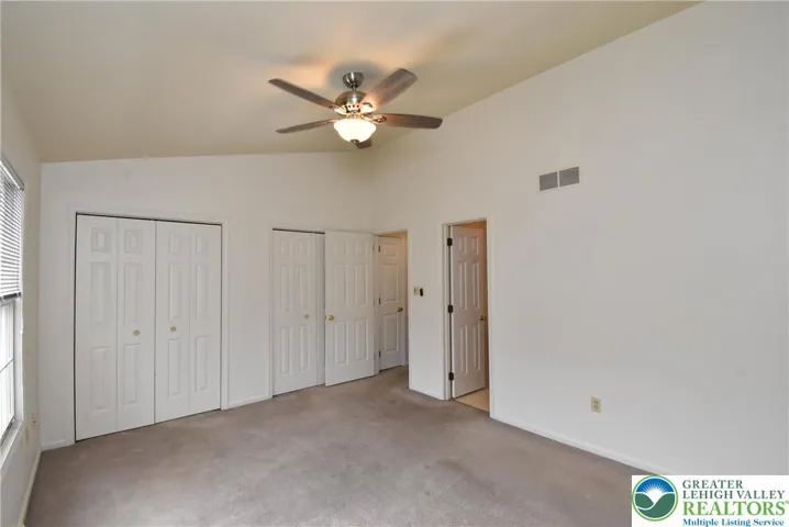 Primary Bedroom with Vaulted Ceiling