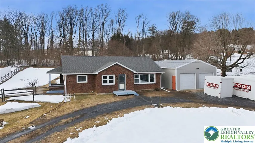 All brick ranch on 1.3 acres with 23' x 49' Pole Barn / Garage