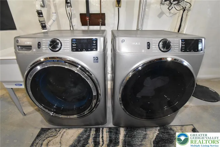 Front load washer & steam dryer