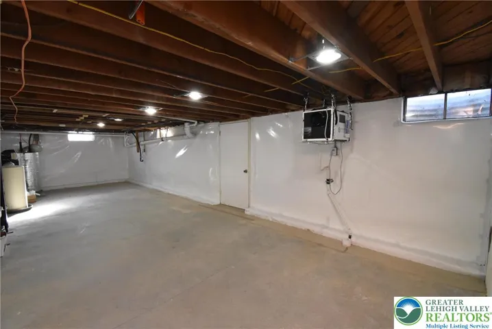 Water-proofed walls ready for finishing basement