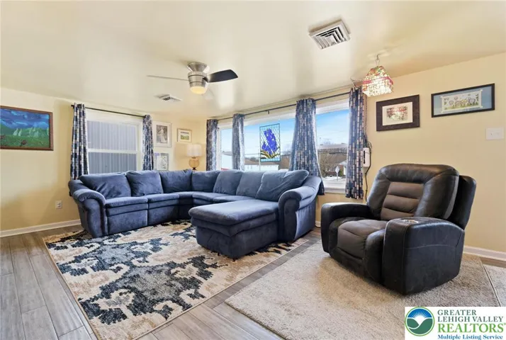 Light & Bright Family Room with Fan/Light and large windows