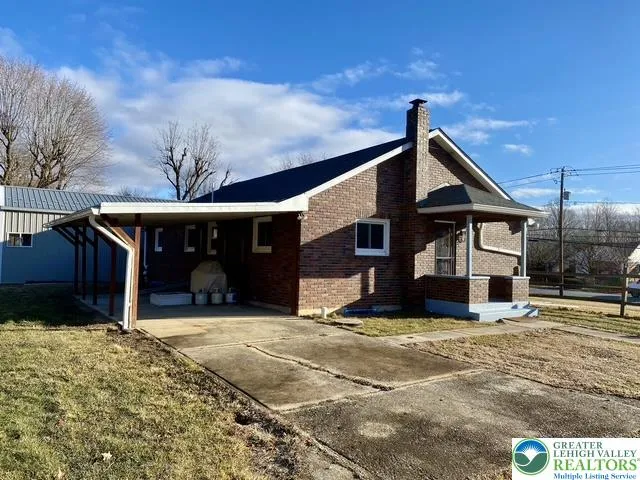 All Brick Ranch home - side covered porch and back covered patio