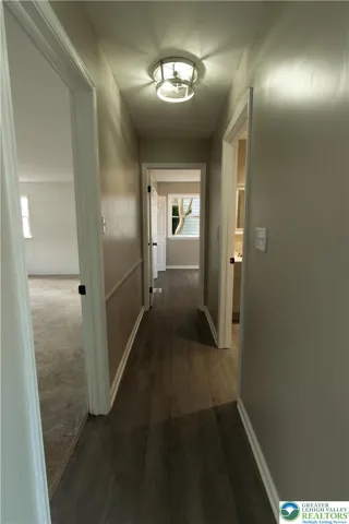 1st floor hallway w/garage lf - bath rt - Bdr. distance