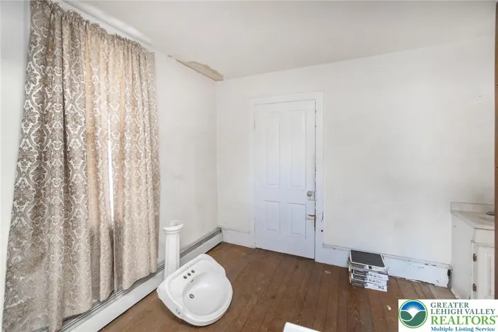 1st floor bonus room with half bath