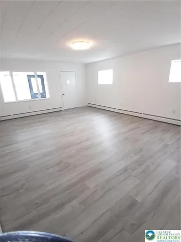 Bright living room with modern ceiling fan