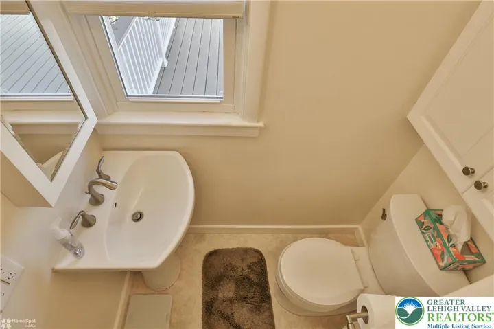 Main bath features a combination ceiling light/night light/exhaust fan combo.  Fan works on manual switch but also on built in humidity sensor.