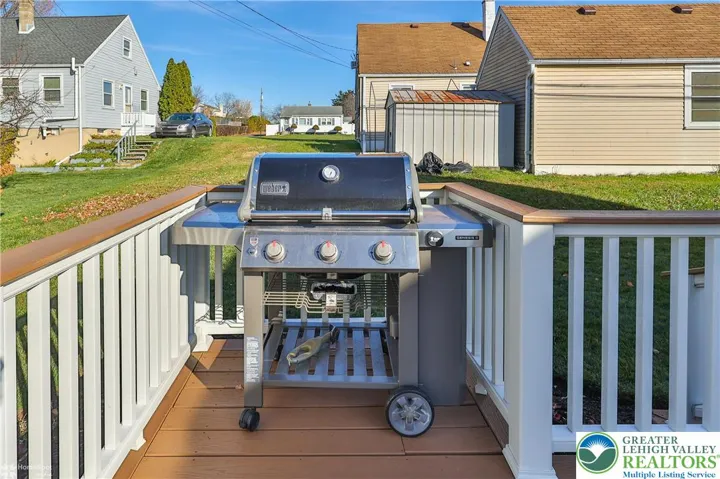 You will love the natural gas grill with a quick connect.  Piped into the house natural gas system.  No lugging LP gas tanks or having them run out in the middle of your cook out.