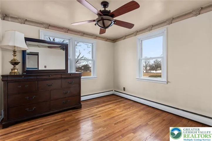 Bedroom 1 with wood floors
