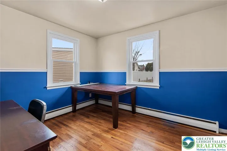 Bedroom 2 with wood floors