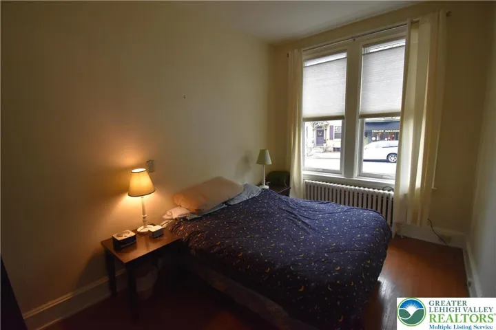 1st Floor bedroom (as single family home, could be made into a Den)