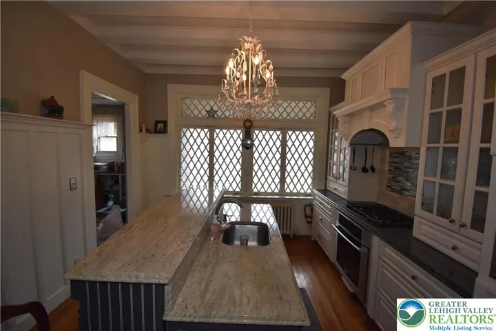 1st floor center island with granite countertops