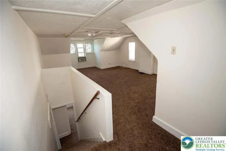 nice size living space with w/w carpeting and window A/C