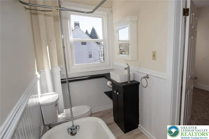 remodeled bathroom with claw foot tub