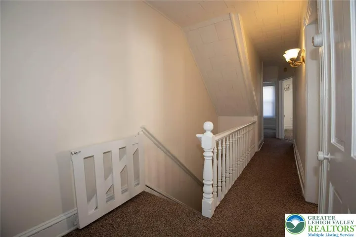 2nd floor carpeted foyer in 730 unit