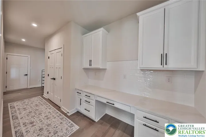 Mudroom, Coat Closet, Drop Zone with Cabinetry and Desk