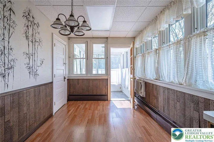Eat in kitchen opens to enclosed rear porch