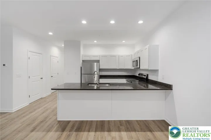 Model photos of townhomes.