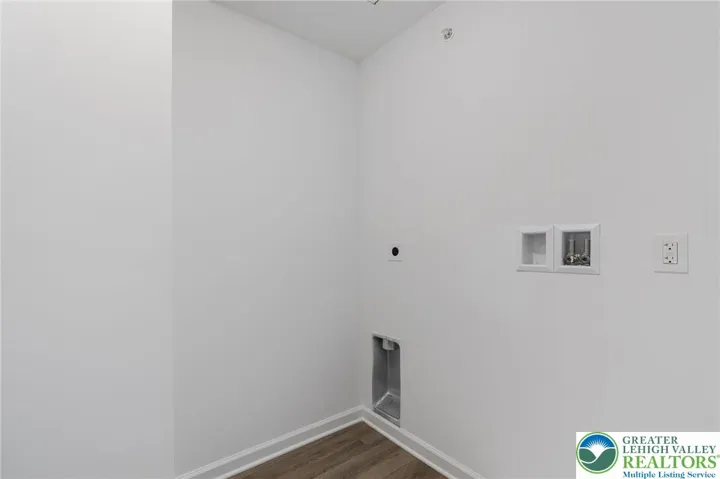 Model photos of townhomes. Second floor laundry room.