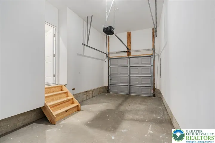 Model photos of townhomes. One car garage.