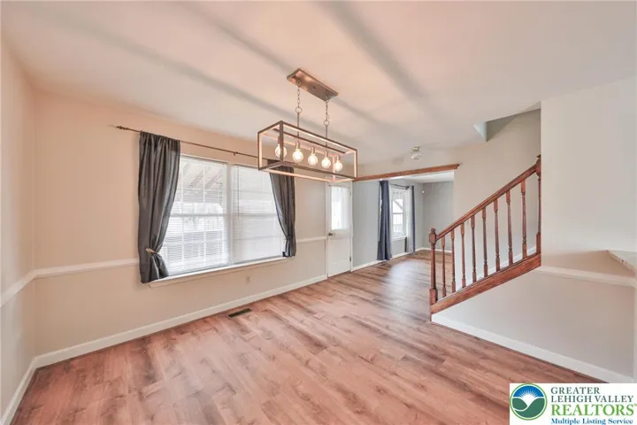 Back Door Leads to HUGE Deck & Fenced Yard