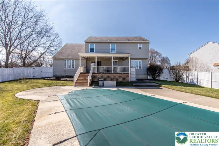Back of home. Pool covered for winter months