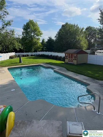 Concrete Pool with heater & plenty of room for your outdoor furniture
