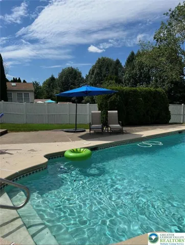 Pool. Pool Equipment nicely hidden behind trees