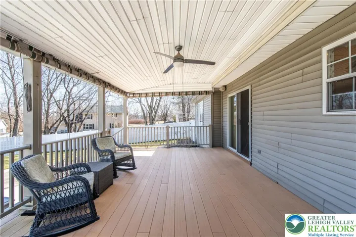 Beautiful Covered Back Deck (Trex) with custom made roller blinds.  Just off Kitchen area