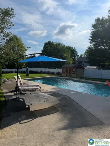 Pool area showing Oversized Shed