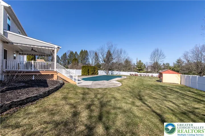 Side view deck/pool/shed/yard