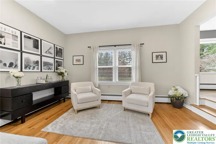 LIVING ROOM WITH STONE FIREPLACE