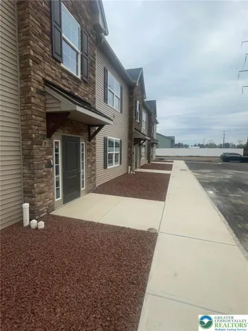 Out front of Unit 101