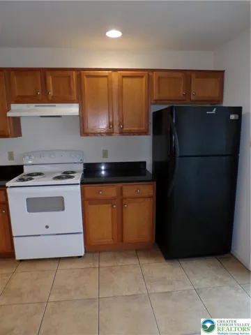 Brand new stove. Refrigerator