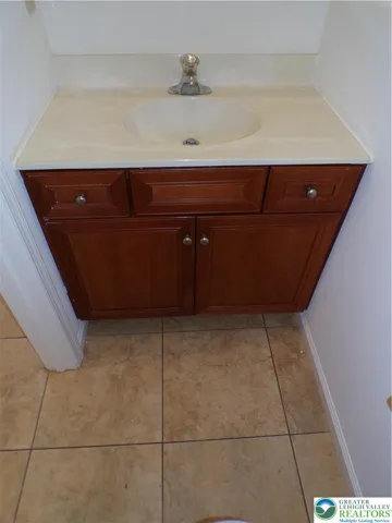 1st floor powder room
sink cabinet