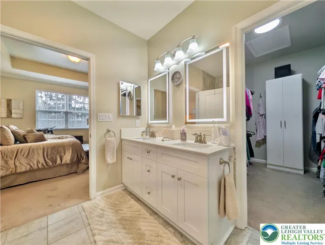 Primary bathroom & walk-in closet