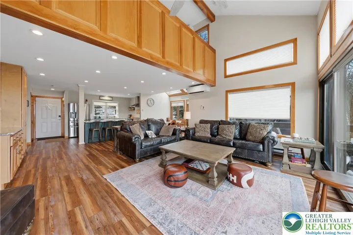 Living Room. Open loft above.