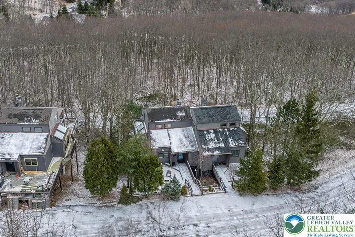 Ariel view. Front view. Property on left.