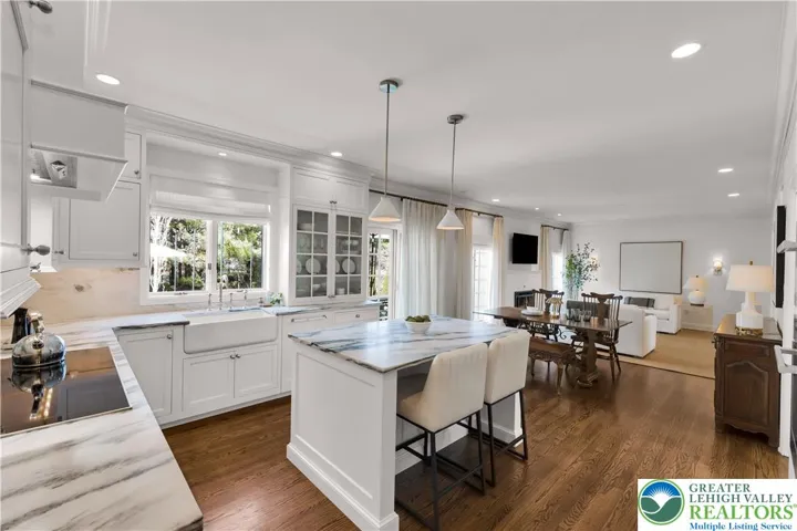 Induction cooktop with a Zephyr hood for powerful ventilation and sleek, modern cooking performance—seamlessly integrated into the custom Jill Jarrett kitchen with Rut Regency cabinetry.