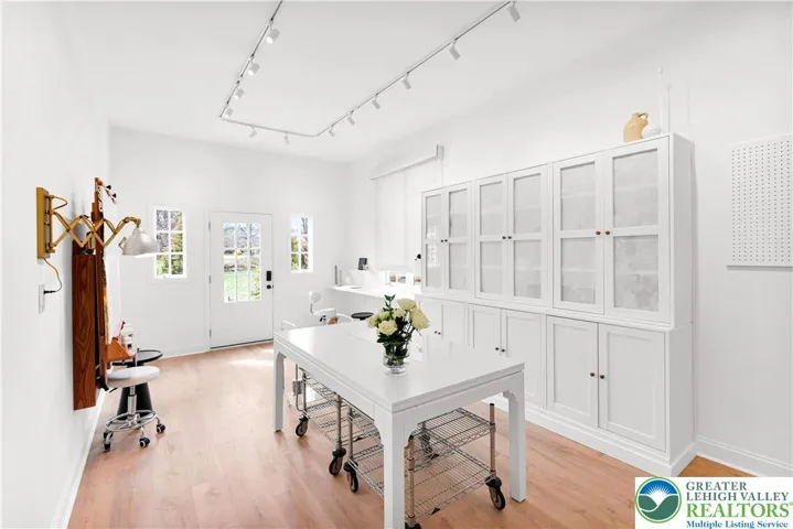 Visualize how you could use this charming space. Custom built-in storage, abundant light and quiet mini-split for your comfort.