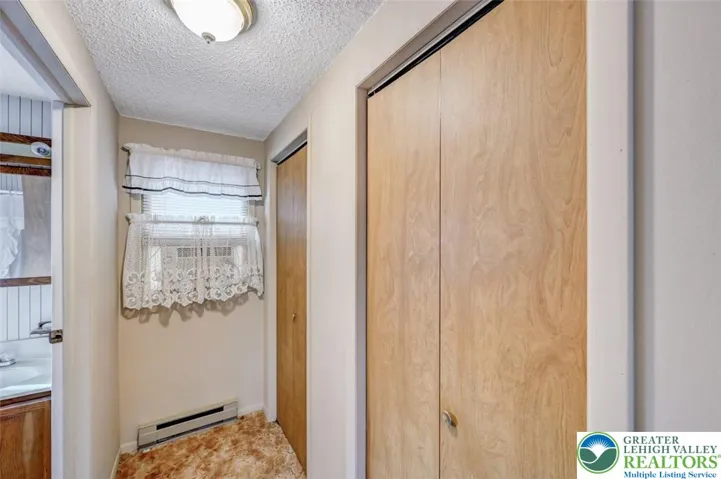 His & Hers Closets In Primary