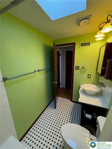 2nd floor full bathroom skylight