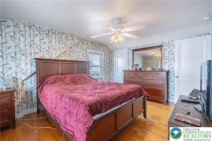 Generously sized primary bedroom offering comfort