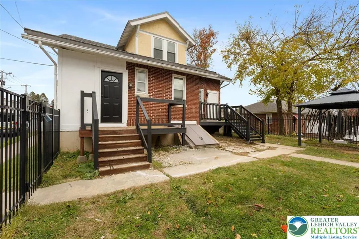 2nd Floor Unit Door to Right (White Door)