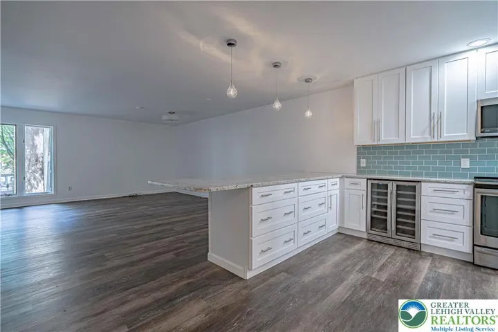 Kitchen island overlooking living/dining area