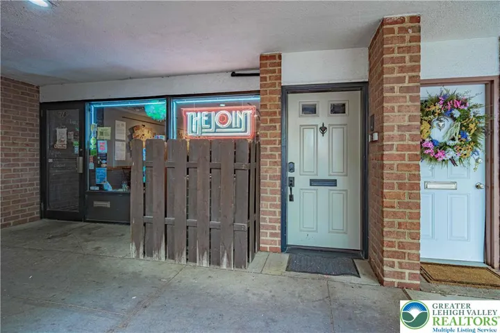 Entry door next to The Joint!